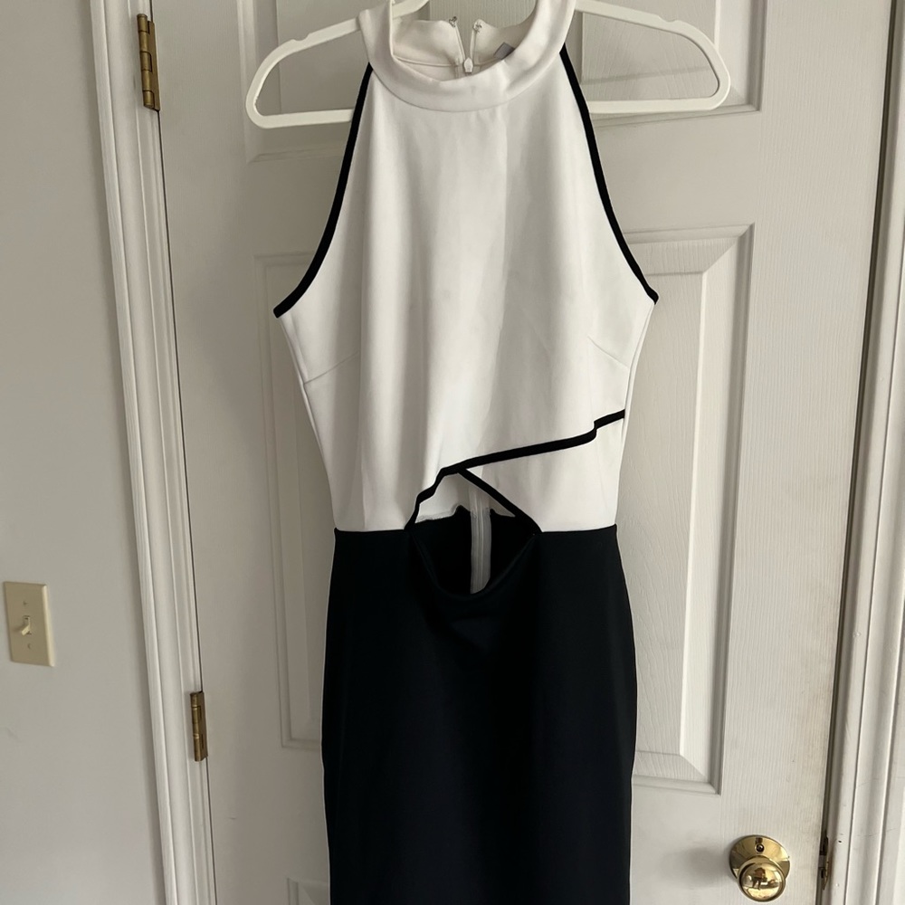 Black and white cut out sleeveless dress is 14